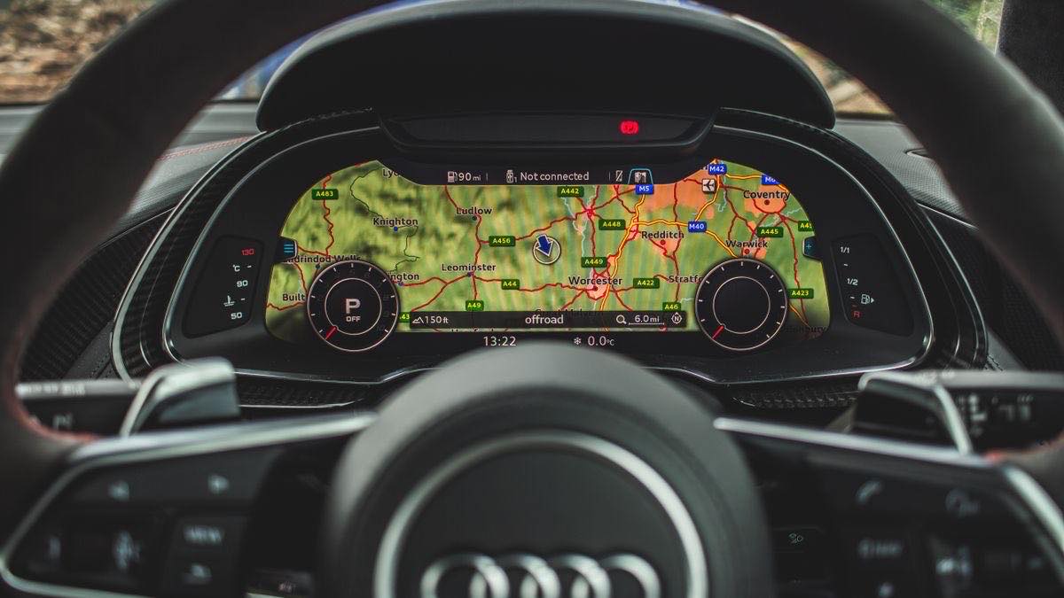 A car dashboard showing GPS map navigation, illustrating location-based Google Maps API data