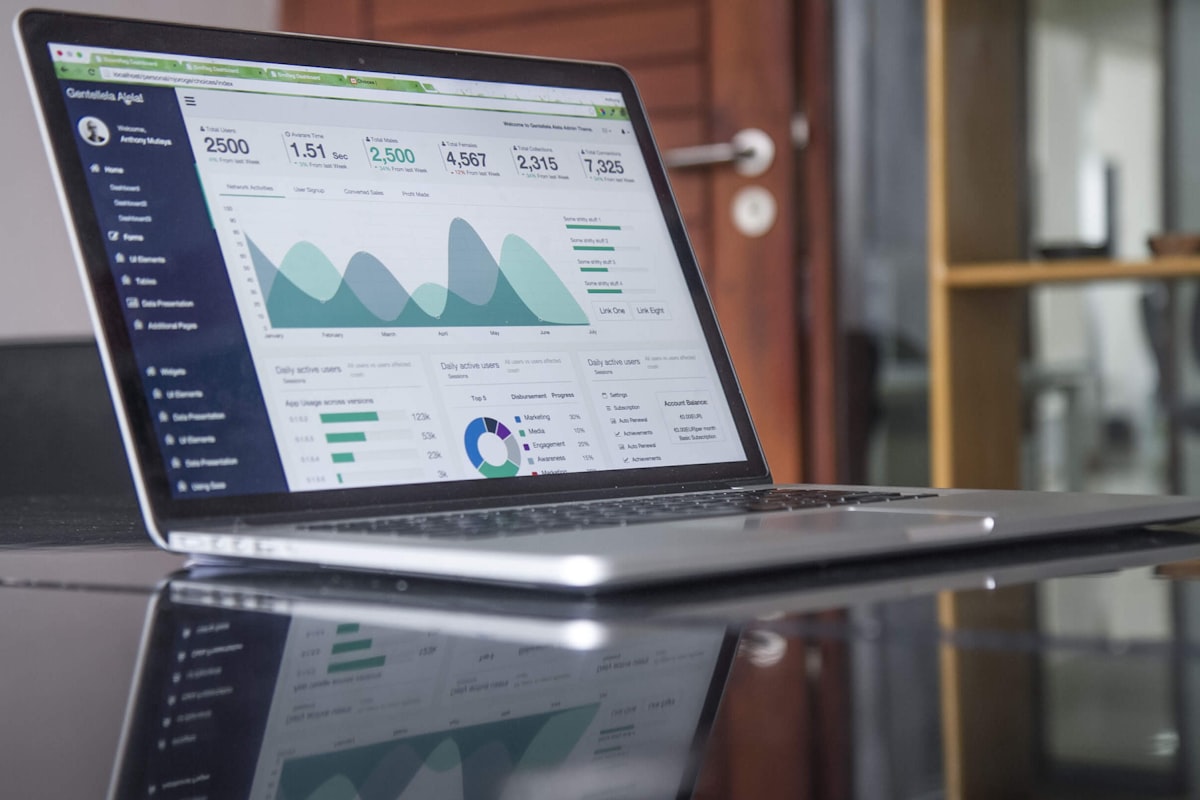 A marketer analysing competitor paid search ads on a laptop