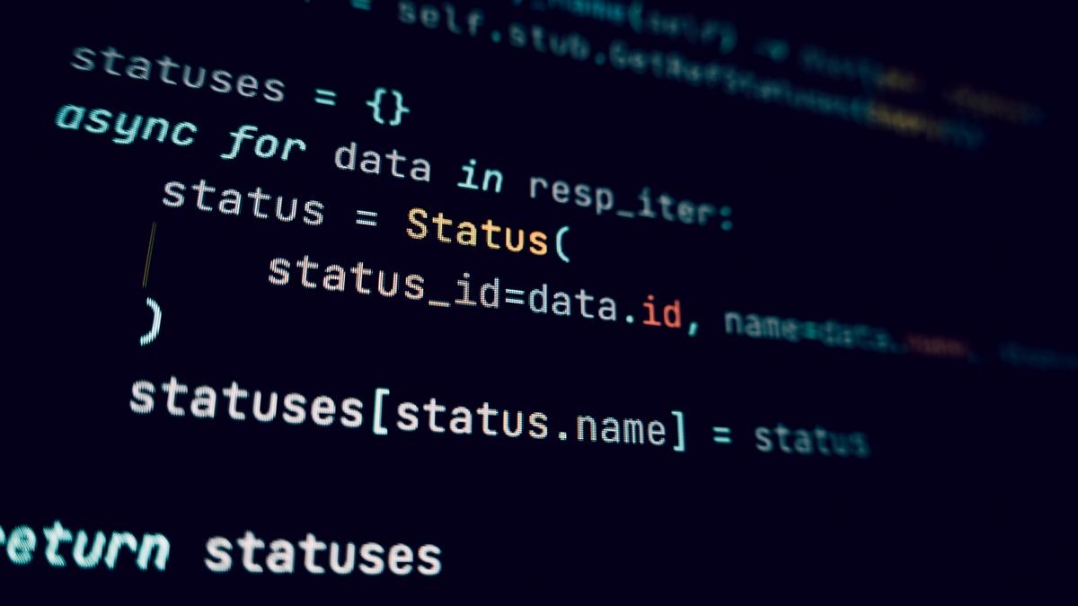 Programming code on a dark screen, representing the Google Maps API quickstart