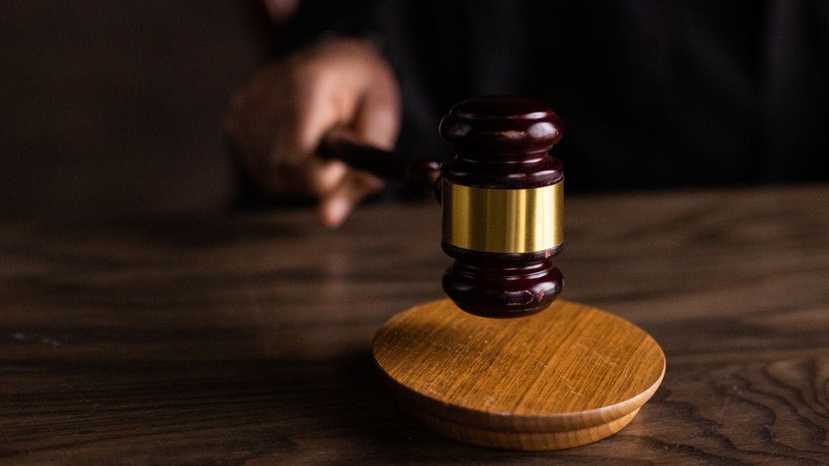 A judge's gavel resting on its block — the legal questions around scraping public LinkedIn data