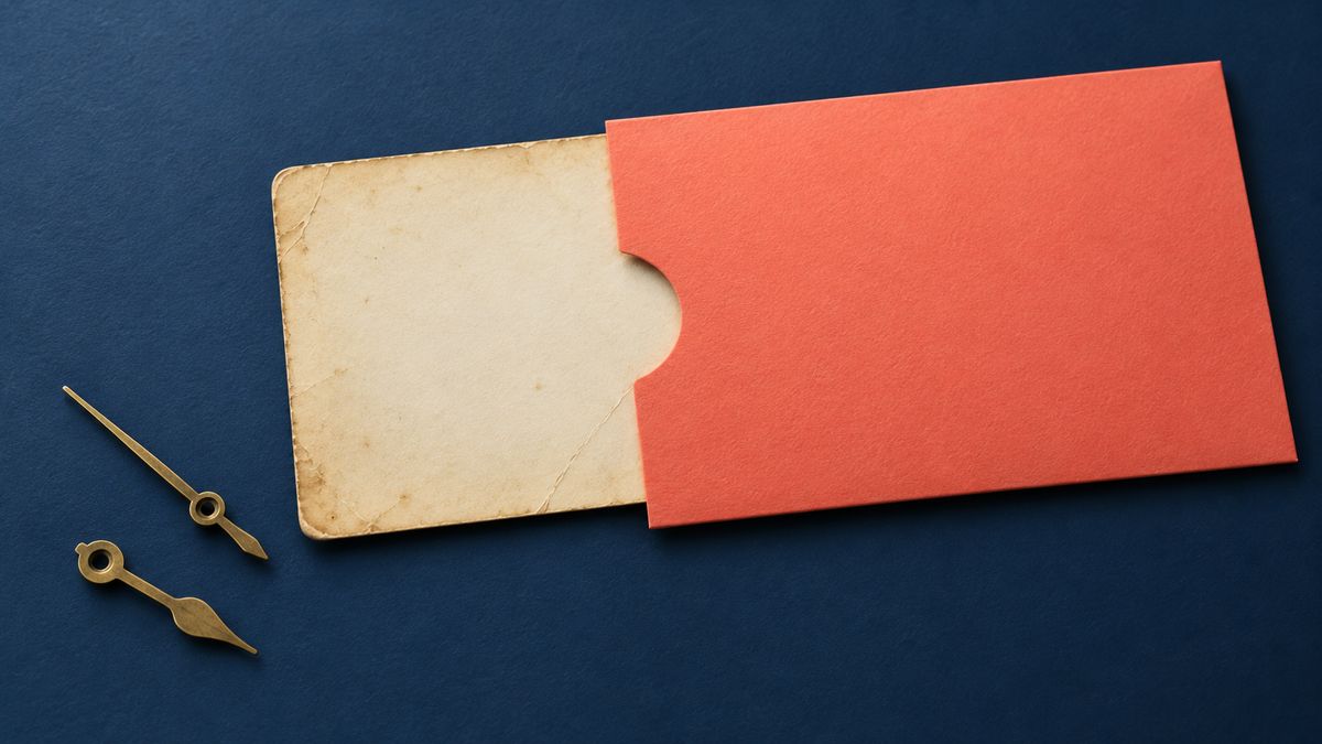 Older ivory story card partly covered by a newer coral sleeve and separate clock hands