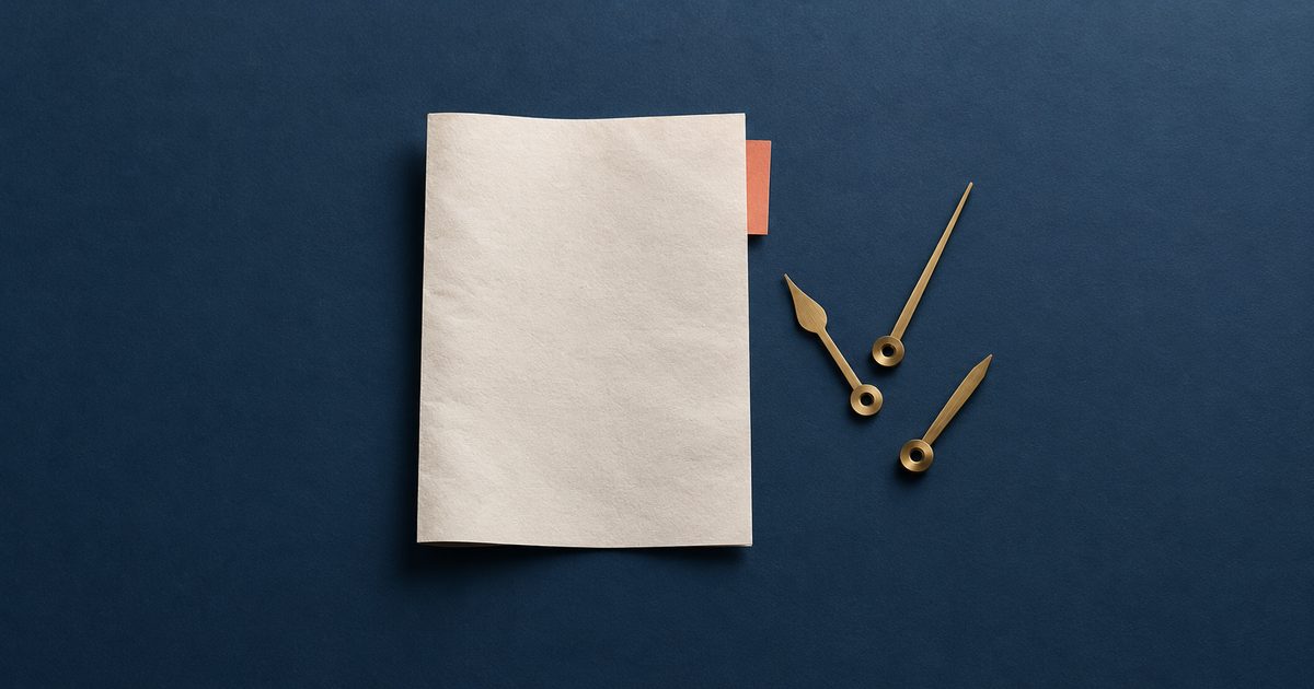 Blank news sheet beside three brass clock hands at different angles on a blue surface