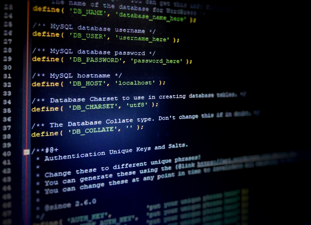 wp-config.php database settings on screen, representing PHP running on WordPress hosting