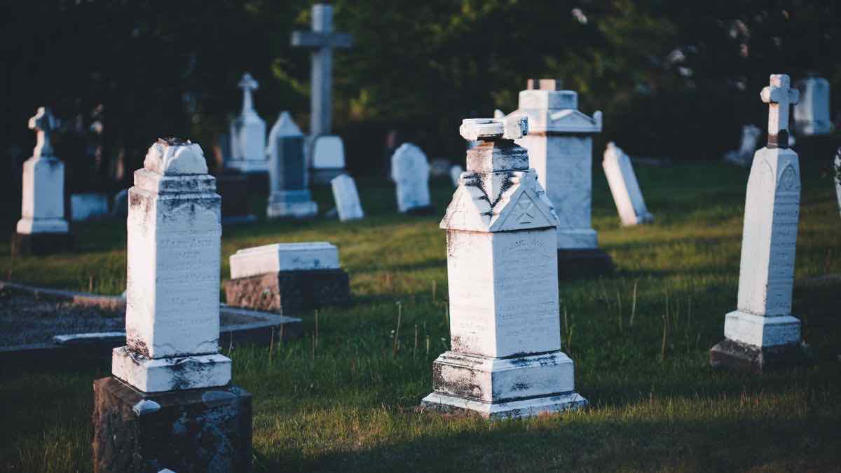 Weathered headstones in a cemetery at dusk, a metaphor for dead Python google search library packages on PyPI