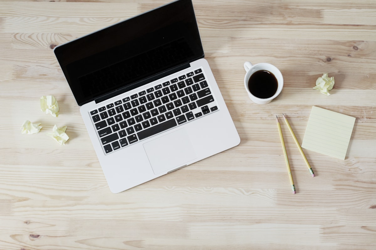 Researcher noting customer questions for keyword discovery