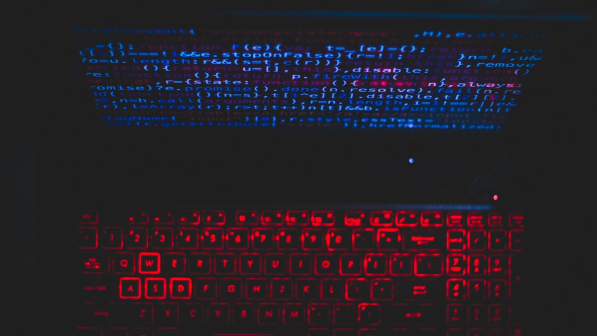 Red glitching code on a dark screen, representing a scraper breaking on selector drift