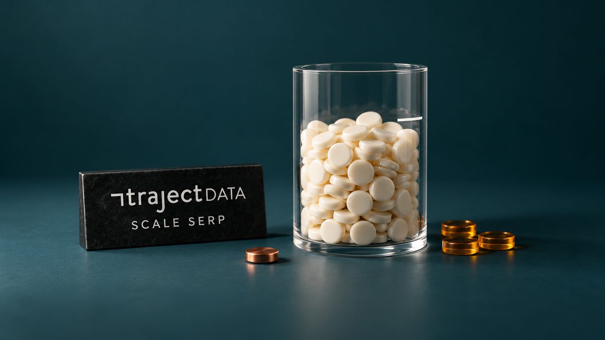 Traject Data and Scale SERP plaque beside a glass search-capacity cylinder and extra tokens