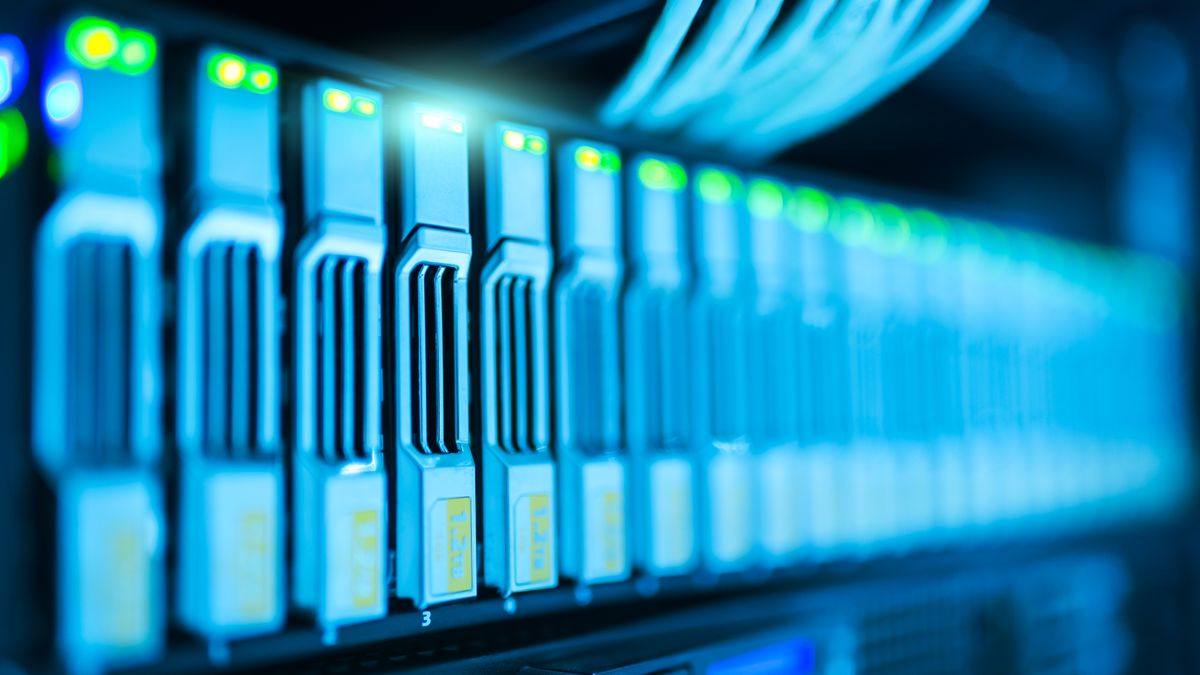 Glowing blue server blades in a data center, representing the Bing index that powers Yahoo and DuckDuckGo