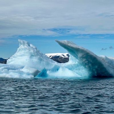 Drift ice breaking up on open water off Greenland